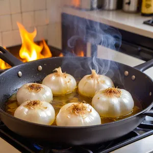 Рецепт Буйабес с кальмарами и розмарином - Обжарка лука и чеснока
