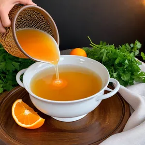 Рецепт Бульон из утки с апельсином и гвоздикой - Процеживание и подача