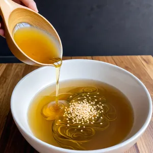 Рецепт Бульон с водорослями комбу и кунжутным маслом - Добавление кунжутного масла