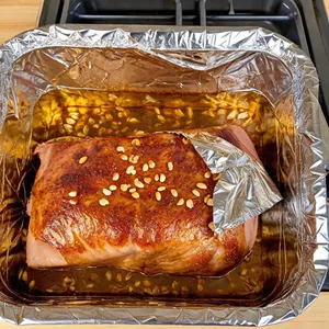 Рецепт Буженина с мёдом и кедровыми орешками в гранатовом маринаде - Запекание буженины