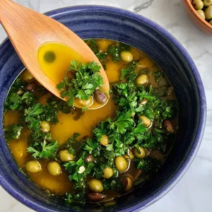 Рецепт Дорадо в фольге с оливками и каперсами - Приготовление ароматной смеси