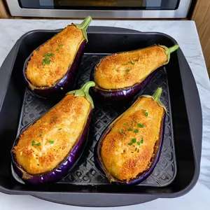 Рецепт Фаршированные баклажаны с киноа и гранатовым соусом - Запекание