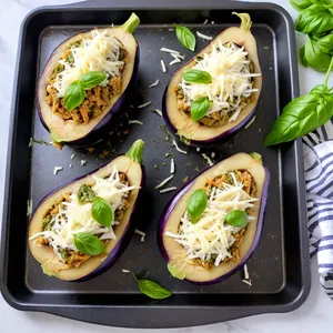 Рецепт Фаршированные баклажаны с курицей и соусом песто - Фаршировка баклажанов