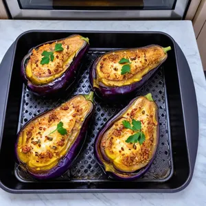 Рецепт Фаршированные баклажаны с кускусом и гранатовой заправкой - Запекание