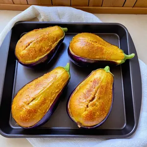 Рецепт Фаршированные баклажаны с сыром фета и мятой - Запекание