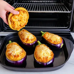 Рецепт Фаршированные баклажаны с творогом и чесноком - Запекание