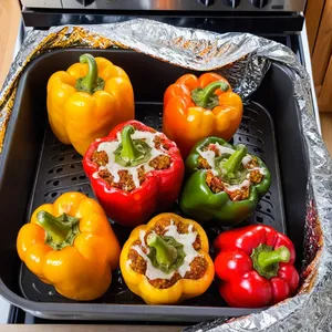 Рецепт Фаршированные перцы с брынзой и оливками - Запекание