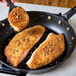 Рецепт Фиш-энд-чипс с корочкой из фундука и апельсиновым соусом - Жарка рыбы