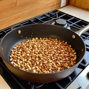 Рецепт Фруктовый салат с дыней и кедровыми орешками под мятным сиропом - Обжарка кедровых орехов
