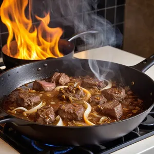 Рецепт Говядина, томлёная с ананасом и имбирём - Обжарка мяса и лука