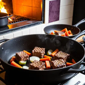 Рецепт Говядина, томлёная с черносливом и гвоздикой - Обжарка мяса и овощей