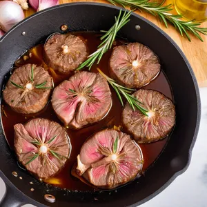 Рецепт Говядина, томлёная с персиками и розмарином - Добавление овощей и специй