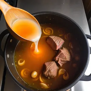 Рецепт Говяжий бульон с кореньями и чесноком - Добавление ароматических компонентов