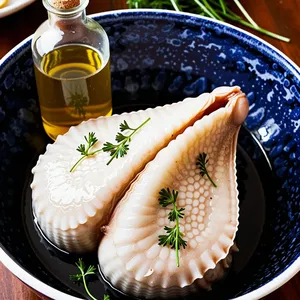 Рецепт Каракатица с чесночно-травяным маслом на гриле - Маринование каракатицы