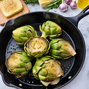 Рецепт Картофельное пюре с обжаренными артишоками и лимонным соком - Обжарка артишоков