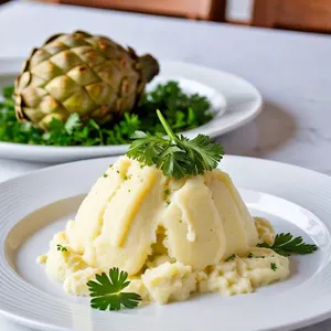 Рецепт Картофельное пюре с обжаренными артишоками и лимонным соком - Подача блюда