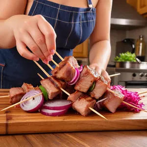 Рецепт Кебаб из свинины с апельсиновым маринадом и розмарином - Нанизывание на шпажки