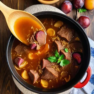 Рецепт Харчо с говядиной и сливами - Добавление риса и слив