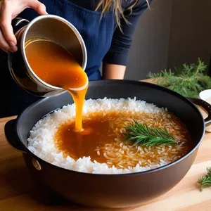 Рецепт Харчо с кабаном и можжевеловым соусом - Добавление риса и можжевелового соуса