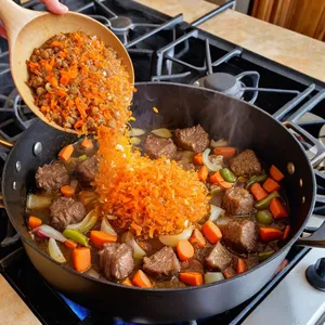 Рецепт Харира с бараниной и черносливом - Обжарка мяса и овощей