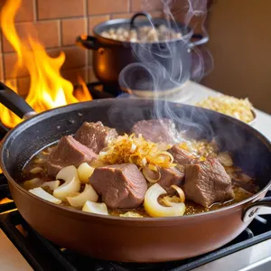 Рецепт Харира с бараниной и грушей - Обжарка мяса и лука