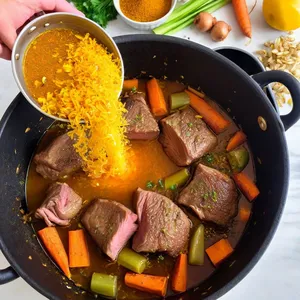 Рецепт Харира с бараниной и вишней - Обжарка мяса и овощей