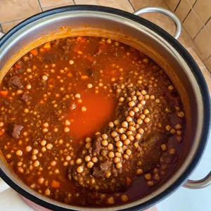 Рецепт Харира с бараниной и вишней - Добавление бобовых и томатной пасты