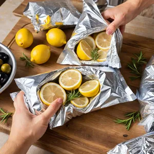 Рецепт Хек в фольге с лимоном и оливками - Формирование порций в фольге