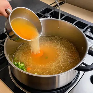 Рецепт Холодец из утки с апельсиновой цедрой и гвоздикой - Процеживание бульона
