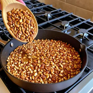 Рецепт Хумус с карамелизированным луком и кедровыми орешками - Обжарка кедровых орешков