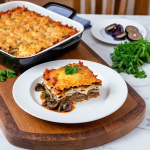 Рецепт Мясная запеканка с баклажанами и эдамером - Подача