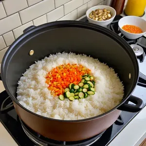 Рецепт Овощной плов с бататом и кинзой - Закладка риса