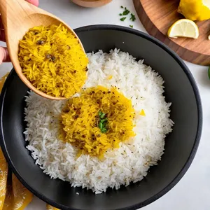Рецепт Овощной плов с брокколи и кедровыми орешками - Добавление риса и специй