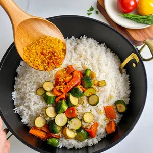 Рецепт Овощной плов с фенхелем и гранатом - Заправка рисом