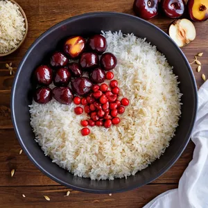 Рецепт Плов с бараниной и алычой - Закладка риса и алычи