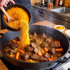 Рецепт Плов с бараниной и финиками - Обжарка мяса и овощей