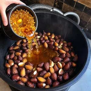Рецепт Плов с бараниной и финиками - Добавление фиников и чеснока
