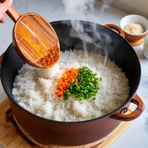 Рецепт Плов с бараниной и финиками - Закладка риса