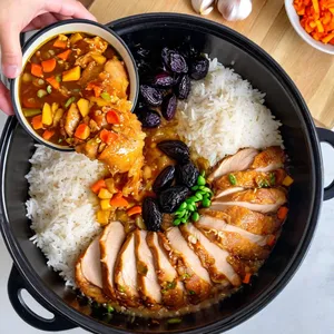 Рецепт Плов с курицей и черносливом - Добавление риса и чернослива