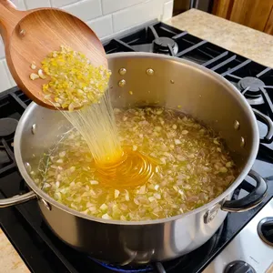 Рецепт Потаж из тыквы с имбирем и кокосовым молоком - Обжарка лука, чеснока и имбиря