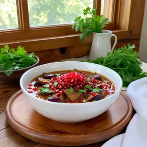 Рецепт Рагу с баклажанами и финиками в гранатовом соусе - Подача блюда