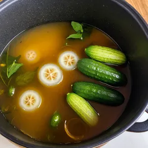 Рецепт Рассольник с уткой и гречкой - Добавление соленых огурцов и рассола