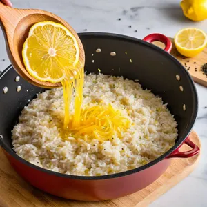 Рецепт Ризотто с артишоками и лимоном - Добавление лимона и специй