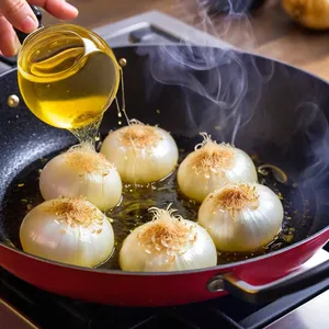 Рецепт Ризотто с брокколи и чеддером - Обжарка лука и чеснока