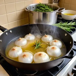 Рецепт Ризотто с кукурузой и розмарином - Обжаривание лука и чеснока