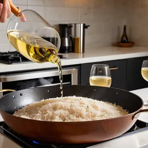 Рецепт Ризотто с кукурузой и розмарином - Добавление риса и вина