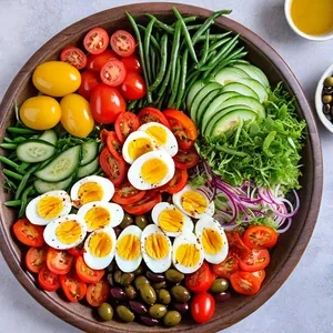 Рецепт Салат Нисуаз с печеными овощами и анчоусами - Сборка салата