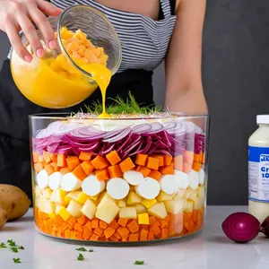Рецепт Сельдь под шубой с ананасом и фисташками - Сборка салата слоями