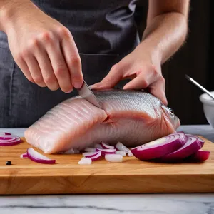Рецепт Сельдь под шубой с грушей и грецкими орехами - Подготовка сельди и лука