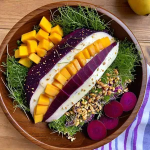 Рецепт Сельдь под шубой с манго и кедровыми орешками - Финальное украшение